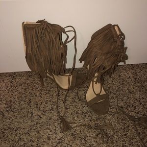 Woman’s heeled tassel sandals